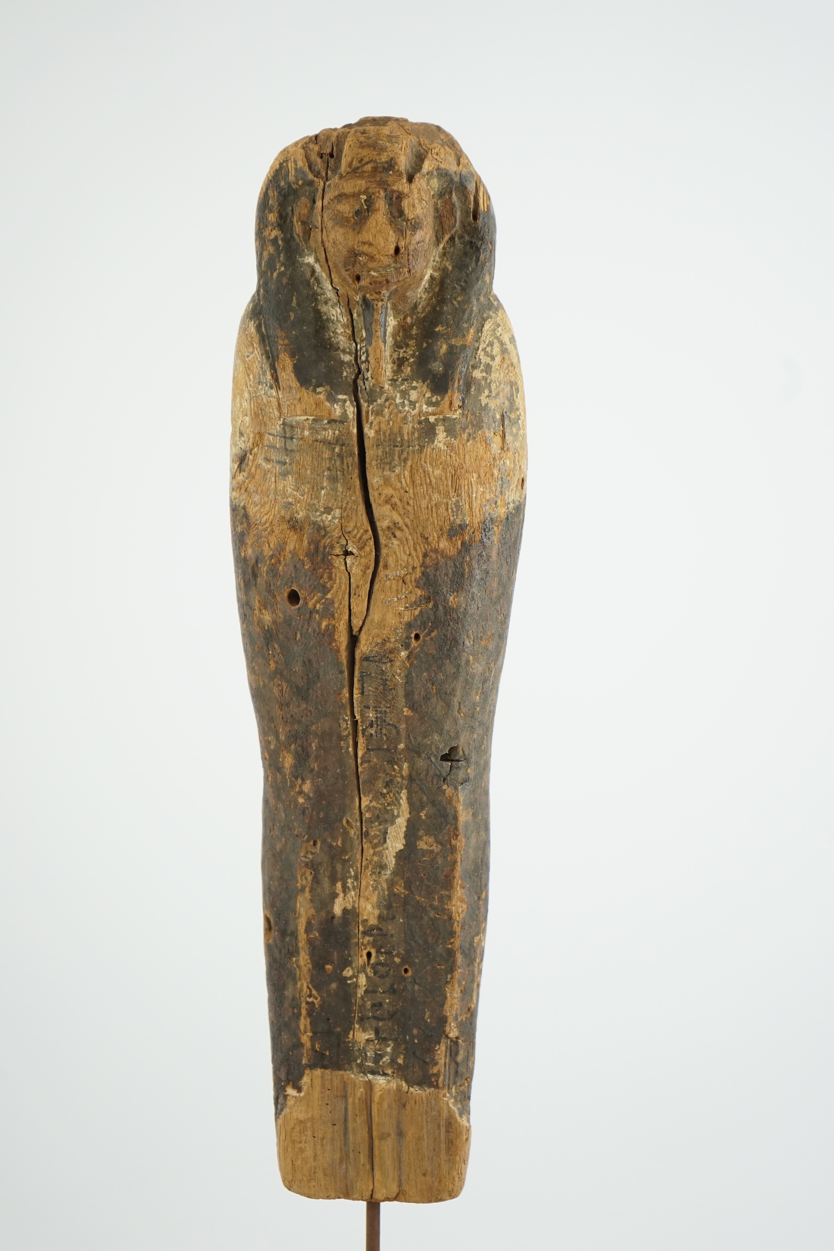 An Ancient Egyptian miniature wood statuette of Ptah-Sokar-Osiris, probably late Kingdom